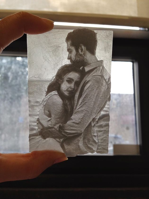 A picture of another lithopane held up to the light.