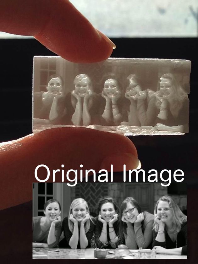 A picture of a lithopane held up to the light.