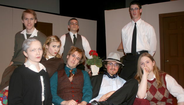 Katherine poses with the cast of a play.